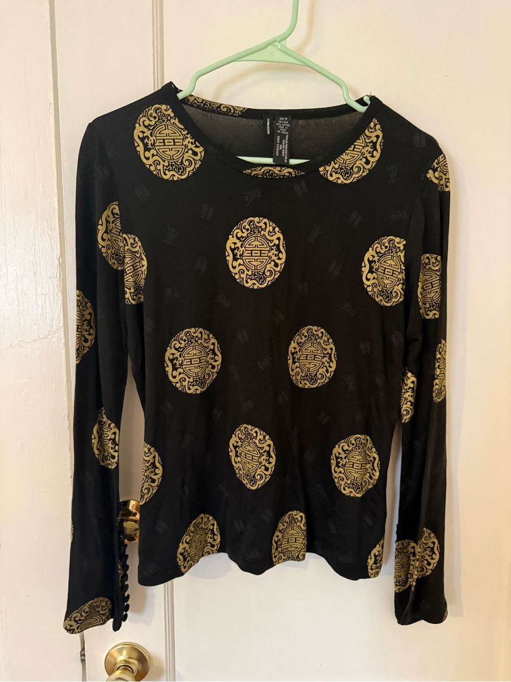Women's Black Long Sleeve Silk Top with Gold Medallion Print